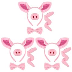 pink pig ears and bow ties on white background