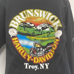 a black long sleeved shirt with an image of a motorcycle and the words brownswick harley - davidson troy, ny