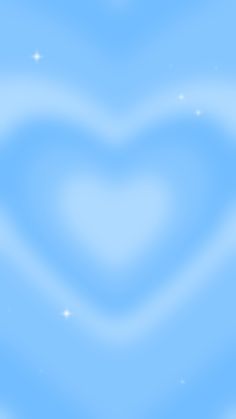 a blue heart shaped background with stars in the sky