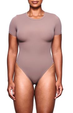 From Kim Kardashian's sought-after SKIMS, this  T-shirt bodysuit perfectly hugs your curves and is perfect to wear alone or layer under closet essentials. Crewneck Short sleeves 76% polyamide, 24% elastane Machine wash, tumble dry Imported Essentials Crewneck, Shirt Bodysuit, Closet Essentials, Hug You, Kim Kardashian, Soft Fabric, Soft Fabrics, Short Sleeves, Nordstrom