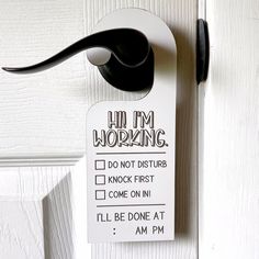 a door hanger that says i'm not working