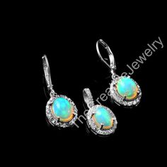 925 Sterling Silver Genuine Ethiopian Opal Pendant With Earring Jewelry  Item Detail- Product-Pendant With Earring Color-Multi Color Gemstone-Ethiopian Opal Weight-5.77gram Earring Size-1.10inch Photo Shoot Flash: Yes gorgeous Opal Jewelry Set ABOUT US- WE are manufacture of gemstone jewelry....all jewelry are made through our trained labors we work only natural gemstone.. Customer's Satisfactions is the first priority for us that's why we believe in providing Best Quality Products to Buyers Shi Sterling Silver Drop Earrings With Bail, Sterling Silver Jewelry Sets With Drop Earrings, Sterling Silver Jewelry Sets With Matching Earrings, Sterling Silver Teardrop Jewelry With Bail, Sterling Silver Dangle Jewelry Sets For Anniversary, Sterling Silver Drop Earrings Jewelry Sets As Gifts, Sterling Silver Jewelry Sets With Dangle For Anniversary, Sterling Silver Jewelry Sets With Drop Earrings For Gifts, Silver Oval Jewelry Sets With Matching Earrings