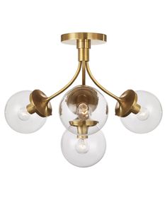 three light brass ceiling fixture with glass globes