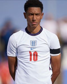 a soccer player is looking at the camera