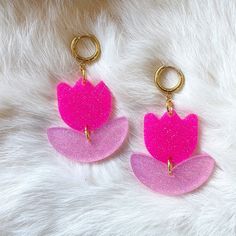 The flower power is strong with these Hot Pink Judy Earrings! These playful, pink petals are sure to add a striking pop of color to your look. Whether you are color blocking or simply playing with your look, these earrings are a must-have in our book. We rhymed! You can never have enough pink, darling. This style of earrings would serve as an excellent focal point of your look. They are certain to elevate an entrance wherever you go. You could wear your hair up or down and all eyes are sure to l Petal-shaped Pink Jewelry For Party, Pink Petal Earrings For Party, Playful Pink Earrings For Party, Playful Pink Hoop Earrings Gift, Trendy Pink Flower Earrings, Handmade Pink Flower-shaped Earrings, Handmade Pink Petal Flower Earrings, Pink Flower Charm Drop Earrings, Pink Dangle Earrings With Flower Charm