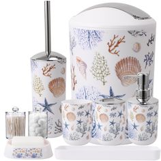 bathroom accessories including soap dispenser, toothbrush holder and toilet paper roll