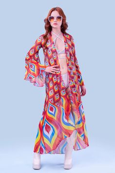 Jazzed Duster – BADINKA Spring Beach Fitted Kimono, Spring Beach Cover-up Duster, Festival Open Front Cover-up, Flowy Open Front Printed Cover-up, Fitted Red Summer Kimono, Open Front Duster For Spring Vacation, Spring Vacation Open Front Duster, Spring Beach Cover-up Duster Open Front, Flowy Long Cover-up For Festival