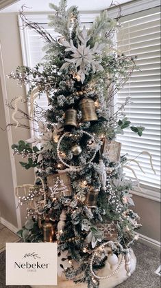 a christmas tree decorated with bells and ornaments