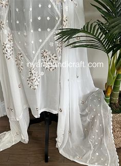 Fine georgette Chikankari Dupatta with hand embroidery and gota add ons with crochet lace. Wedding Dupatta With Cutwork For Festivals, White Cutwork Dupatta For Festivals, White Bohemian Semi-stitched Embroidered Fabric, Bollywood Style Cutwork Dupatta For Festivals, Traditional Embroidered Cutwork Fabric For Festive Season, Traditional Festive Embroidered Cutwork Fabric, Traditional Festive Embroidered Fabric With Cutwork, Festive Bollywood Cutwork Dupatta, Traditional Chanderi Cutwork Dupatta