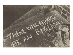 there will always be an england sign on the side of a building in black and white