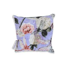 a purple pillow with flowers and butterflies on the front, sitting against a white background