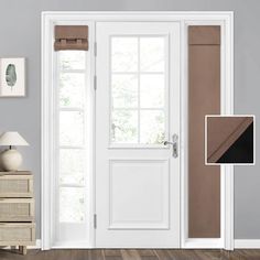 a white door in a room with wood flooring