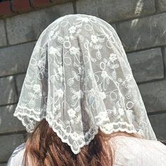 Introducing our versatile chapel veil, available in black, white, and beige fabrics. This elegant veil features delicate lace and a graceful, flowing design, making it a perfect choice for reverent occasions and religious ceremonies. The classic colors offer options to suit various preferences, while the refined detailing ensures a touch of sophistication for any wearer. Ideal for enhancing spiritual attire and meeting the needs of diverse congregations. NOTE: Wash by hand only, lay flat to dry. White Ceremony Veil, Lace Veil With Lace Trim For Ceremonies, Ceremony Veil With Lace Trim, Lace Ceremony Veil With Lace Trim, Ceremony Lace Veil With Lace Trim, Fitted White Veil, White Fitted Lace Veil, Fitted White Lace Veil, Cream Lace Bridal Accessories