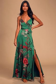 The Lulus Still the One Emerald Green Floral Print Satin Maxi Dress is a party favorite! Sleek satin, in a mauve, red, peach, and green floral print, falls from adjustable spaghetti straps (that crisscross at back) into a princess-seamed surplice bodice. High, fitted waist, with tying sash, tops a full maxi skirt with front slit. Hidden back zipper. Disclaimer affiliate link attached Reformation Wedding, Floral Bridesmaid Dresses, Outfits Wedding, Spring Wedding Guest Dress, Full Maxi Skirt, Emerald Green Dresses, 2022 Wedding, Guest Attire, Wedding Attire Guest