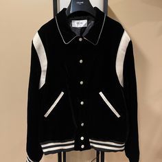 Celine X Hedi Slimane Black Velvet Teddy Varsity Jacket Rare Size 54 (Extremely Rare Size); Could Fit L-Xl Brand New W/ Tags Very Rare And Sought After Black Velvet Teddy Jacket. This Is Not The Corduroy Version That Restocked Multiple Times. Extremely Low Quantities Made Per Size. Only One Listed Anywhere Online. This Is 54 Nearly Extinct. Luxury Black Varsity Jacket With Padded Collar, Luxury Black Varsity Jacket For Winter, Luxury Black Varsity Jacket For Fall, Celine Varsity Jacket, Velvet Teddy, Hedi Slimane, Phoebe Philo, Men's Outerwear, Teddy Jacket