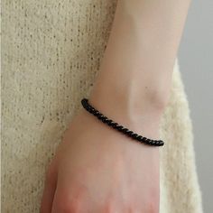 Add a touch of sophistication to your wrist with our Black Onyx Beaded Bracelet—a sleek and versatile accessory that seamlessly blends the timeless beauty of black onyx beads with a minimalist design. Metal: Recycled Sterling Silver Gemstone: Black Onyx 4mm Length: 170mm Weight: 5g Onyx Bead, Black Agate, Summer Clothing, Unique Gemstones, Deep Black, 925 Silver Jewelry, Swarovski Pearls, Smokey Quartz, Keep Jewelry