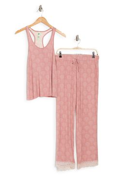 Lounge in ultimate comfort in this super soft scoop neck tank and pajama bottoms set. 2-piece set Top: 24" length; Pants: 13" rise, 29" inseam (size S) Top: scoop neck, sleeveless, racerback, knit construction, lace trim Bottoms: elasticized drawstring waist, pull-on style, knit construction, lace trim 95% rayon, 5% spandex Machine wash Imported Model’s stats for sizing: 5’11” height, 32” bust, 24” waist, 34” hips. Model is wearing size S. Casual Sleeveless Lounging Sets, Comfortable Relaxed Fit Tank Top For Loungewear, Spring Relaxed Fit Tank Top For Loungewear, Casual Sleeveless Sleepwear For Loungewear, Casual Tank Top For Sleepovers In Spring, Honey Crisp, Pajama Bottoms, Honeydew, Racerback Tank