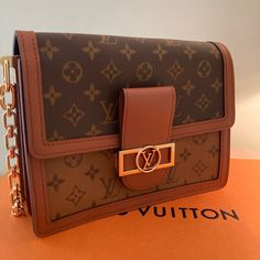 New Never Used Louis Vuitton Bag Authentic New Collection Rectangular Monogram Canvas Shoulder Bag With Chain Strap, Travel Shoulder Bag With Chain Strap And Monogram Canvas, Monogram Canvas Shoulder Bag With Chain Strap For Travel, Brown Monogram Canvas Shoulder Bag With Chain Strap, Brown Monogram Canvas Bag With Chain Strap, Louis Vuitton Odeon, Louis Vuitton Neverfull Gm, Louis Vuitton Vernis, Used Louis Vuitton