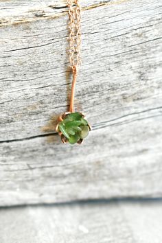 Rough Nephrite Jade lotus pendant necklace. A flower pendant in shimmering 14K rose gold fill and soft greens of Jade, an August birthstone. My copyrighted Lotus design series is flourishing with this fresh Jade gemstone, hugged by rose gold fill. Very pretty, petally and delicate. You choose the necklace length. Ready to ship worldwide in under 7 days. Scroll to read more. *My 14K Rose Gold fill is 5 layers of solid gold over sterling* SHIPPING INFO: : Ships within 7 business days. You now get Green Gemstone Flower Pendant Jewelry, Green Gemstone Flower Pendant Necklace, Green Gemstone Flower Pendant Necklaces, Delicate Green Flower Pendant Jewelry, Unique Opal Ring, Info Ships, Lotus Flower Jewelry, Jade Pendant Necklace, Unique Opal