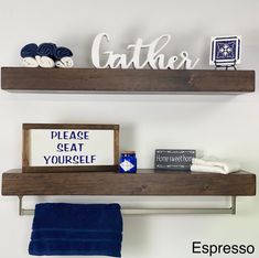 two wooden shelves with towels and other items on them