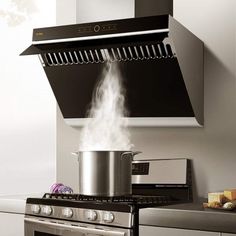 a stove top oven with steam coming out of it