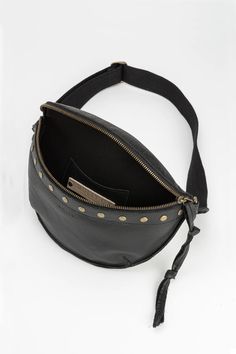 This stylish and convenient bum bag, crafted from genuine leather, adds a touch of flair to every look. Featuring adjustable straps, a crossbody design, and antique brass rivets, the Lucy bag is designed to keep your necessities secure and easily accessible. Perfect for everyday or special occasions, the Lucy bag offers unbeatable style and practicality. Genuine leather 10"W x 6.5"H Comfortable 1.5" wide cotton blend adjustable strap for maximum comfort Zipper closure Antique brass hardware Line Sleep Accessories, Fur Mama, Antique Brass Hardware, Cuff Rings, Bum Bag, Slipper Socks, Brass Hardware, Rivets, Belt Bag