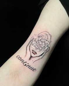 a woman's arm with a tattoo on it that says couture and a rose