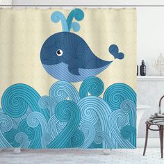 a shower curtain with a blue whale in the ocean on it's side and waves