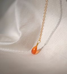 Harness the potent energy of Carnelian! Carnelian is the orange variety of Quartz that's known for its ability to stoke creativity, foster positivity, and stimulate passion. This isn't just a necklace – it’s a tool for transformation.We hand select each triangular-shaped gem when crafting your one-of-a-kind necklace. Carnelian naturally ranges in color from orange to red and can be either solid in color, or with colorful bands running through it. If you have a preference for a stone type please Orange Gemstone Drop Jewelry, Orange Drop Gemstone Jewelry, Handmade Orange Drop Jewelry, Orange Drop Jewelry For Gift, Handmade Orange Teardrop Necklace, Orange Chalcedony Jewelry For Gifts, Orange Carnelian Necklace In Spiritual Style, Orange Teardrop Citrine Jewelry, Orange Briolette Jewelry For Gift