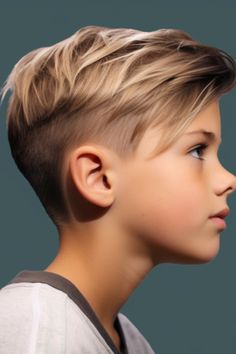 The asymmetrical undercut is a choice for boys who want to make a statement. It involves a skin fade on one side and longer hair on the other creating a visually striking design. Click here to check out more trendiest boys haircuts for school. Boys Long Hair On Top Short On Sides, Long Hair On Top Short On Sides Boys, Long Top Short Sides Boys Haircut, Boys Hair Long Top Short Sides, Kids Hair Cuts For Boys Fade, Boys Hair Cuts 2023 Trends Kids, Boy Hair Cuts Long On Top, Trendy Boys Haircuts 2023, Hear Cut Boys