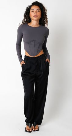 Our Keira Top features an asymmetric length and a center back zipper Knit 76% nylon 24% spandex Stretch Top, Spandex, Zipper, Grey, Knitting