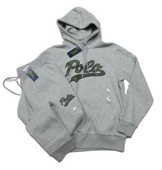 PLEASE NOTE: DUE TO HIGH VOLUME AND POST OFFICE DELAYS, DELIVERY TIMES MAY BE LONGER THAN NORMAL. ALL SALES ARE FINAL. NO RETURNS ACCEPTED. POLO RALPH LAUREN GREY HEATHER LOGO SCRIPT GRAPHIC HOODIE & JOGGER PANT SET HOODIE: ATTACHED DRAWSTRING HOOD LONG SLEEVES PULLOVER STYLE RIBBED TRIM EMBROIDERED LOGO CAMO SCRIPT GRAPHIC AT CHEST FLEECE LINED TWO SIDE POCKETS AT WAIST 70% COTTON 30% POLYESTER MACHINE WASHABLE IMPORTED JOGGER PANTS: DRAWSTRING ELASTICIZED WAIST EMBROIDERED CAMO LOGO GRAPHIC AT LEFT LEG TWO SIDE ON-SEAM POCKETS RIGHT BACK PATCH POCKET RIBBED HEM 70% COTTON 30% POLYESTER MACHINE WASHABLE IMPORTED ALL ITEMS ARE 100% AUTHENTIC AT YOURPLACE2SHOP International Buyers – Please Note:  Import duties, taxes, and charges are not included in the item price or shipping cost. These ch Cute Online Clothing Stores, Lauren Grey, Polo Outfit, Track Suits, Logo Script, Jogging Suit, Pant Set, Casual Style Outfits, Polo Ralph Lauren Mens