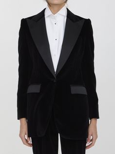 This Dolce & Gabbana Turtlington Tuxedo Jacket includes silk duchesse accents. It features peaked lapels, a single-breasted single-button closure, a welt pocket on the chest, two flap pockets on the front, and buttoned cuffs. The jacket also has a silk satin lining and is designed for a regular fit.   Size nationality: Italy  Velvet  Regular fit  Buttoned cuffs  Peaked lapelsWelt pockets  Product code: F2942TFUVG7N0000  Composition: 82% cotton, 14% silk, 4% polyester Velvet Tuxedo Jacket, Velvet Tuxedo, Red Valentino Shoes, Tuxedo Blazer, Feminine Chic, Stefano Gabbana, Glamorous Dresses, Tuxedo Jacket, Dress With Cardigan