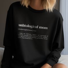 Introducing our Definition Print Clothing Collection - a charming and versatile addition to your everyday life! We're thrilled to introduce you to our 'unbiological mom' definition print t-shirts, crewnecks, and hoodies. These are not your regular shirts; they are conversation starters, designed to add a dash of humor and a sprinkle of wit to your everyday attire. These sweathers features a unique 'definition' design that makes it an excellent gift idea for any occasion. Perfect as a funny gift idea or as a unique present that is sure to bring a smile to anyone's face. Our definition shirts are available in a variety of vibrant colors including Red, White, Black, Navy, Royal, and Gray. They come in sizes S, M, L, and XL, ensuring a comfortable fit for everyone. Whether you're looking for a Step Mom Quotes, Mom Definition, Word Definition, Definition Design, Funny Clothing, Perfect Definition, Mom Quote, Step Mom, Word Definitions