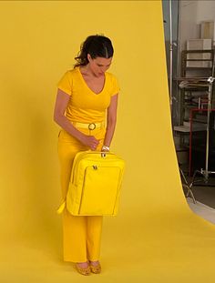 Yellow backpack. Big Bird may have been wearing one this whole time. A bright, yellow backpack can really transform a look from drab to rad. Plain yellow backpack, for the win. Stylish, cheery. Nothing says POP like a yellow anything, especially a vegan leather yellow backpack. Do our largest star a solid and help brighten up the world with a yellow backpack. Vegan Leather. 14 x 17 x 7 Yellow Backpack For Everyday & Back To School, Trendy Yellow Backpack For Everyday Use, Trendy Yellow Backpack For Everyday, Yellow Leather Backpack For Daily Use, Yellow Leather School Backpack, Yellow Leather Backpack For School, Yellow Leather Standard Backpack, Yellow Leather Backpack, Plain Yellow