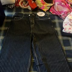 Size 2 Dark Denim Pinstripe Jeans Trendy Pinstripe Wide Leg Bottoms, Spring Bottoms With Contrast Stripes And Straight Leg, Blue High-waisted Pants With Vertical Stripes, Casual High Waist Pinstripe Pants, Trendy High Waist Striped Pants, Trendy High-waist Striped Pants, Trendy Bottoms With Contrast Stripes For Spring, Trendy Blue Bottoms With Vertical Stripes, Trendy High Waist Pinstripe Bottoms