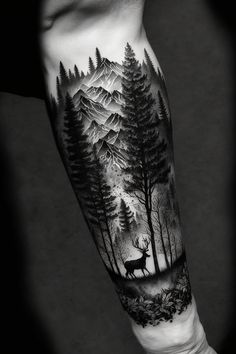 a man's arm with a forest scene and deer in the woods on it