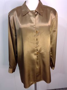 This Color Wow's Button Cuffs, 3 Button Placket, 2 Snaps Shoulder Pads Removeable Voluminous Sleeves 100% Poly VGVC with no flaws noted Size Large - Refer to Measurements: Bust/42" Sleeve/25" Length/28" Smoke & Pet Free Studio Voluminous Sleeves, Color Wow, Tunic Style, Tunic Styles, 80s Vintage, Tunic Blouse, Button Placket, Ariel, Shoulder Pads