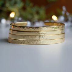 "You can engrave this quote or any other text on our gold-plated timeless bracelet. - Narrow bracelet engraved with your chosen message. - The  thickness of gold plating is around 0.5 microns - Text, coordinates, numbers or handwriting outside and inside the cuff  - Up to 90 characters  on each side - Approximately 5mm wide, 16cm long This personalised gold plated bangle will make the perfect gift for mum, sister, grandma, bridesmaid or any other loved one in your life. SIZES: This is the length 90 Characters, Timeless Bracelet, Welcome To Our Family, Om Mantra, Daughter In Law Gifts, 4 Baby, Gold Plated Bangles, Small Jewelry Box, Engraved Bracelet