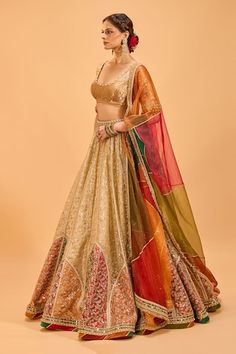 Gold and multicolor attached cancan lehenga with multicolored accents. Paired with a padded banarasi brocade blouse with pearl and sequin embroidery and tasseled sleeves and colorblocked embroidered border dupatta. - Aza Fashions Multicolor Tissue Silk Choli With Dupatta, Multicolor Tissue Silk Sharara For Reception, Festive Multicolor Tissue Silk Lehenga, Multicolor Silk Lehenga For Reception, Multicolor Tissue Silk Choli For Diwali, Multicolor Tissue Silk Lehenga With Zari Work, Multicolor Raw Silk Set With Sheer Dupatta, Multicolor Tissue Silk Choli For Reception, Multicolor Tissue Silk Choli For Wedding