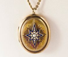 "Jewelry from the Victorian era is renowned for its exquisite craftsmanship and attention to detail. This stunning necklace is no exception. Crafted in the 1870s, the locket features a lovely star design with seed pearls and vibrant blue enamel. A classic chain offers the perfect finishing touch to this beautiful antique treasure. Antique Victorian 14k yellow gold 1876 Enamel and seed pearls Dimensions: 1 1/2\" tall and 1\" wide The necklace is 17\" long" Vintage Star-shaped Wedding Jewelry, Antique Yellow Gold Star Jewelry, Antique Gold Star-shaped Jewelry, Seed Pearl Jewelry, Enamel Locket, Antique Wedding Bands, Victorian Pendants, Rose Gold Pearl, Necklace Antique