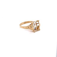 Vintage 1940's 10k yellow gold rectangular stone ring. The ring would be a great travel ring. The size of the ring is a 7, and has the ability to be resized. The height of the ring off of the finger is 4.3mm. The width of the band is 2mm. Center stone measures 10mm x 7.7mm Vintage 14k Gold Signet Ring With Center Stone, Vintage Gold Engraved Ring With Center Stone, Classic Anniversary Ring With Rectangular Shape, Formal Rectangular Birthstone Ring, Rectangular Prong Set Topaz Ring Fine Jewelry, 14k Gold Rectangular Solitaire Jewelry, 14k Gold Ring With Square Cut And Prong Setting, 14k Gold Rings With Square Cut Prong Setting, Classic Rectangular Gemstone Birthstone Ring