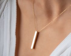 "14k Solid Gold 3D Bar Necklace / Vertical Bar Necklaces / Gold Bar Pendant  / Halloween Gift / Necklaces For Women /Mothers Day Gift / Handmade Jewelry * Gold KT: 14K Solid Gold * Gold Color: 14k Yellow Gold * Chain Lengths: 14\", 15\", 16'', 18\", 20\", 22\", 24\" *  Follow on Instagram - @bayargold.tr My Web Site - https://www.bayargold.com * Bayar Gold is a fine jewelry company. Please do not hesitate to ask us questions. We are always here to help you. * All items are packed in the high-quality jewelry box. The gift message is available. Please let us know what to write by leaving us a note at checkout.  * Gift wrapping available.  Express shipping * United States: 4-6 business days * Canada: 4-6 business days * Europe: 4-6 business days * Australia: 4-6 business days * UK: 4-6 busine Elegant 14k Gold Bar Necklace, Minimalist Yellow Gold Bar Necklace, Modern Gold Bar Necklace With Rectangular Pendant, Classic Yellow Gold Bar Necklace With Rectangular Pendant, Elegant 14k Gold-filled Bar Necklace, Gold Bar Pendant, Cat Necklace Gold, Vertical Bar Necklace, Lovers Necklace