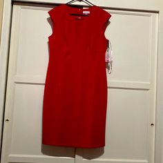 Calvin Klein Sleeveless Red Dress. New With Tags. Red Sleeveless Summer Dress For Work, Red Sleeveless Knee-length Dress For Work, Red Knee-length Sleeveless Dress For Work, Red Sleeveless Dress For Workwear In Spring, Red Fitted Sleeveless Dress For Spring, Red Sleeveless Dress For Spring Workwear, Red Sleeveless Dress For Spring Formal, Calvin Klein Fitted Sleeveless V-neck Dress, Calvin Klein Fitted V-neck Sleeveless Dress