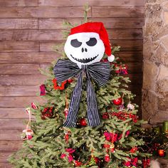 a decorated christmas tree with a skeleton on it