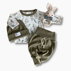 This lightweight sweatshirt is a wardrobe must-have for your little boy. The long-sleeved shirt has a leaf pattern that matches the wide elastic waist pants. Completing the look is a matching beanie. It is crafted from breathable cotton with a relaxed fit. Material: Cotton Sweatshirt Outfit, Elastic Waist Pants, Print Sweatshirt, Leaf Print, Waist Pants, Leaf Prints, Printed Sweatshirts, Leaf Pattern, Baby Shoes