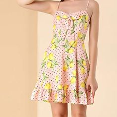 100% Polyester Zipper Closure Bowknot, Concealed Zipper Back, V Neck, Lemon Or Floral Print, Dots, Fully Lined, Ruffle Hem Mini Dress Occasion: Dating, Party, Weekend, Social Activities, Beach, Travel, Valentine's Day, Holiday, Etc Pair With Sandals Or Heels To Set The Mood For Sunny-Day Strolling In This Flowing Lemon Dress Styled With An Asymmetrical Hem, Lemon Polka Dots Pattern. Summer Mini Dresses With Bow Print, Summer Mini Dress With Bow Print, Cute Vacation Dresses With Tie Straps, Cute Vacation Dress With Tie Straps, Cute Dresses With Tie Straps For Vacation, Casual Pink Dress With Knotted Straps, Pink Bow Print Summer Dress, Pink Bow Print Dress For Summer, Fitted Bow Print Summer Dress