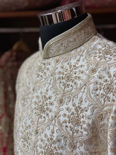 a close up of a white shirt on a mannequin's neckline