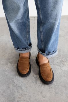 Introducing our  Brown Suede Loafers - a true fashion staple that combines timeless style with utmost comfort. Crafted from supple brown suede, these loafers are designed to elevate your everyday wardrobe effortlessly. The classic penny loafer silhouette adds a touch of sophistication, making them perfect for any occasion - be it dressing up for the office or casual outings with friends. With their versatile color, these brown leather loafers can easily be paired with jeans, dresses, or skirts. Fall Suede Slip-on Platform Loafers, Brown Suede Flat Heel Loafers, Brown Suede Loafers With Flat Heel, Fall Workwear Suede Slip-ons, Brown Round Toe Loafers For Everyday, Brown Everyday Loafers With Round Toe, Brown Suede Loafers With Leather Footbed, Suede Loafers With Leather Footbed For Work, Suede Slip-ons With Round Toe For Work