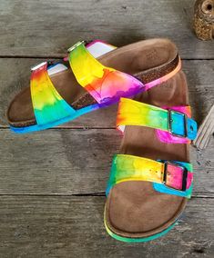 Be bold and be bright! Stand out with NeonTie-Dye Birkenstock-style adjustable slide sandals perfect for the hippie chick! Hand-colored and made to order in women's sizes 6-10. Be bright, be bold, and be colorful in these super comfy and cute tie-dye slide sandals! **Half sizes not available** **Please note these are NOT the Birkenstock brand - they are made from high quality shoe that are just as cute and comfy** Multicolor Slip-on Slides For Summer, Multicolor Slide Sandals For Beach, Adjustable Multicolor Flip Flops For Spring, Multicolor Slide Flip Flops For Vacation, Casual Multicolor Slide Sandals, Spring Multicolor Slide Sandals, Multicolor Spring Slides, Fun Slides For Spring Vacation, Multicolor Cushioned Slides For Spring